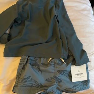 Carters swim trunks and rash guard shirt
